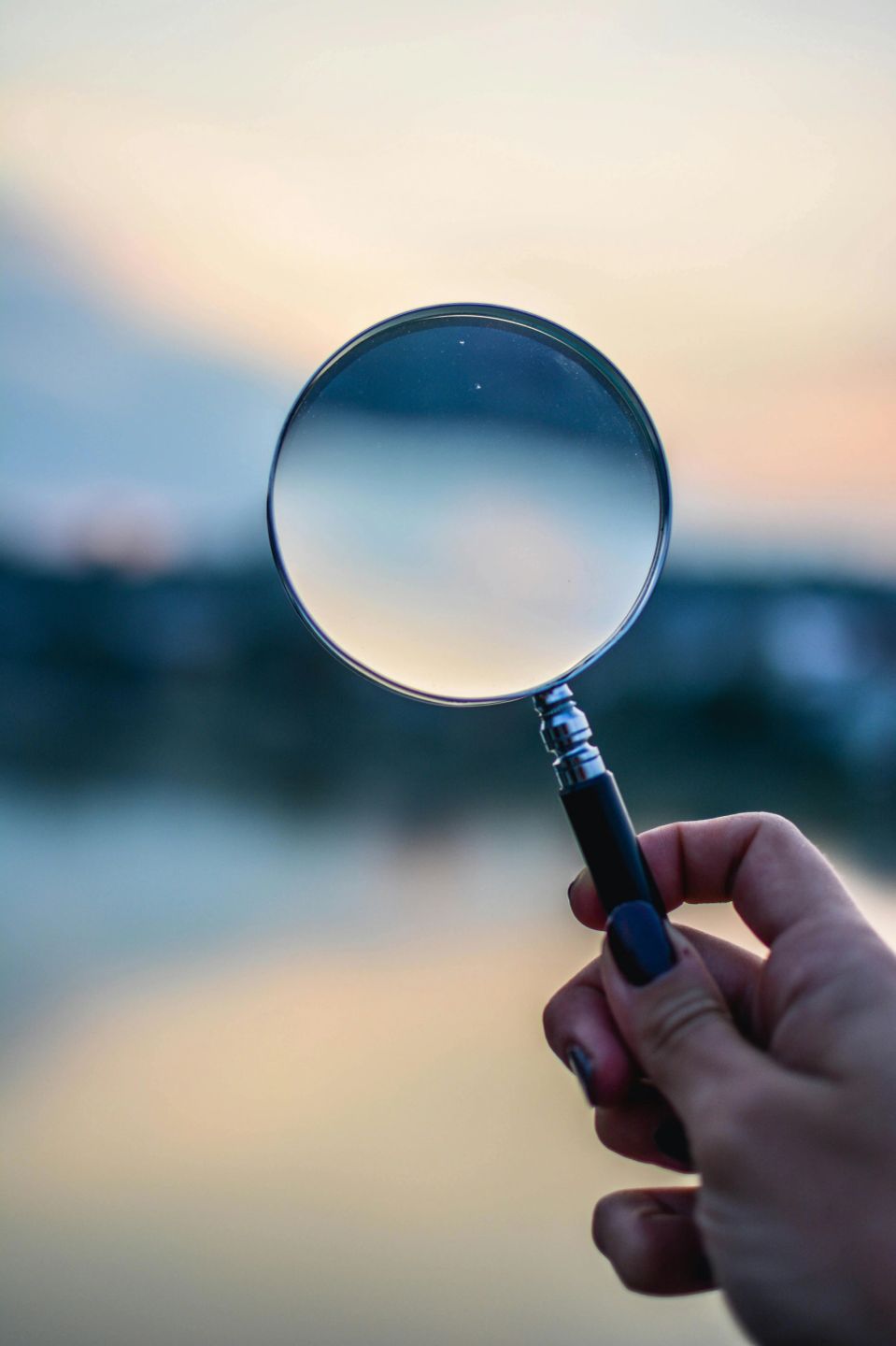 A magnifying glass, representing a thorough inspection